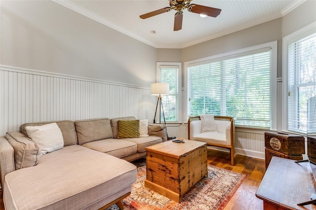 2113 Brooklyn St, Austin, TX 78704 - living area with a ceiling fan, wood finished floors, ornamental molding, and a wainscoted wall