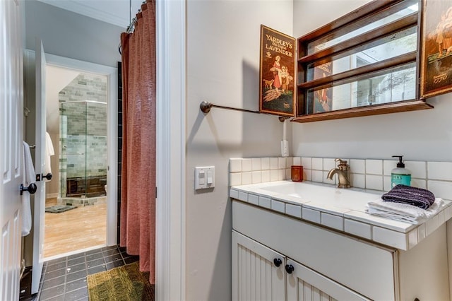 2113 Brooklyn St, Austin, TX 78704 - full bath featuring vanity, a shower with curtain, tasteful backsplash, and tile patterned flooring