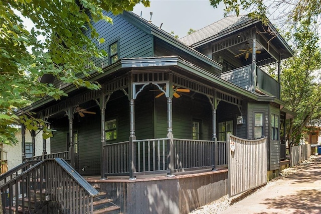 2113 Brooklyn St, Austin, TX 78704 - view of front of property with covered porch, a balcony, and a ceiling fan
