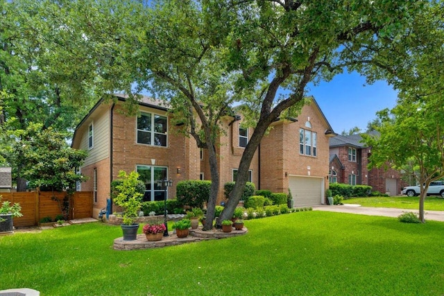 509 Oak Park Dr, Round Rock, TX 78681 - traditional home with a garage, brick siding, and driveway