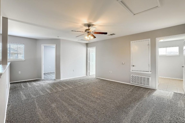 9001 China Rose Dr, Austin, TX 78724 - unfurnished room with carpet floors, a ceiling fan, and baseboards