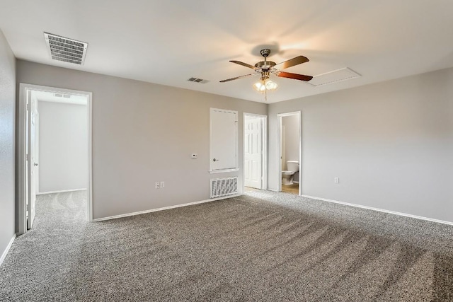 9001 China Rose Dr, Austin, TX 78724 - carpeted empty room featuring ceiling fan, baseboards, and attic access