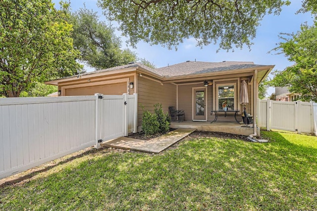 1007 Big Spring Dr, Cedar Park, TX 78613 - back of property featuring a gate, an attached garage, and a ceiling fan