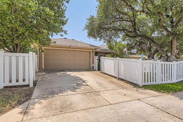 1007 Big Spring Dr, Cedar Park, TX 78613 - garage with concrete driveway
