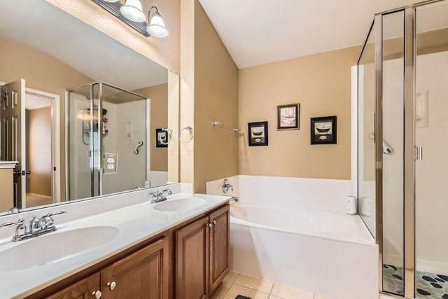 1007 Big Spring Dr, Cedar Park, TX 78613 - bathroom featuring a stall shower, a garden tub, double vanity, and tile patterned flooring