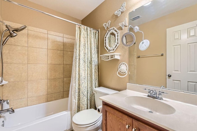 1007 Big Spring Dr, Cedar Park, TX 78613 - full bath with toilet, shower / bathtub combination with curtain, vanity, and a textured wall