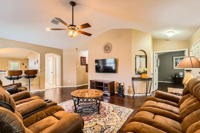 1007 Big Spring Dr, Cedar Park, TX 78613 - living room with arched walkways, a ceiling fan, lofted ceiling, baseboards, and wood-type flooring