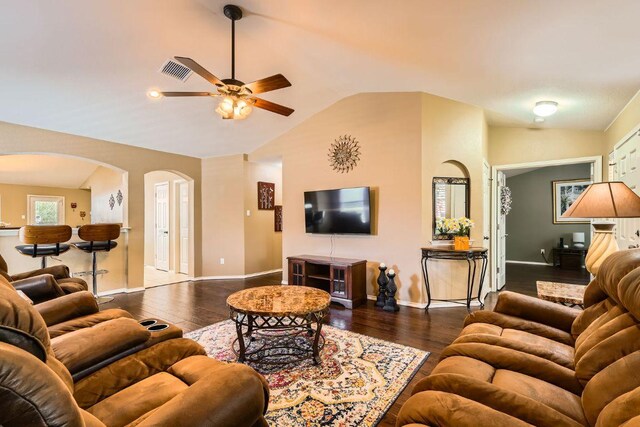 1007 Big Spring Dr, Cedar Park, TX 78613 - living area with arched walkways, ceiling fan, lofted ceiling, baseboards, and hardwood / wood-style flooring