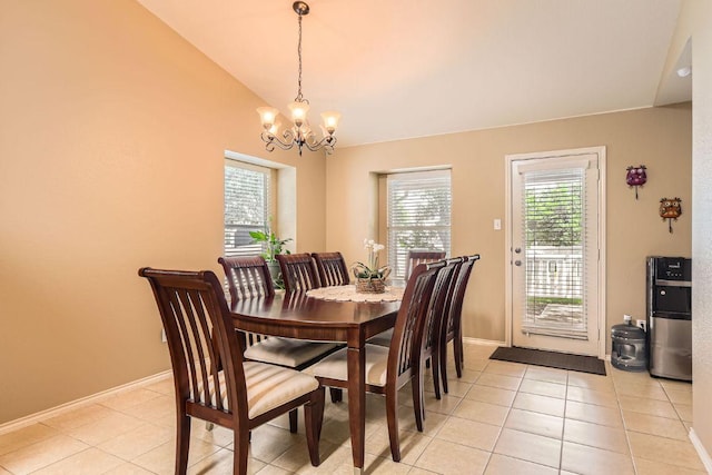 1007 Big Spring Dr, Cedar Park, TX 78613 - dining area featuring a chandelier, light tile patterned floors, baseboards, and lofted ceiling