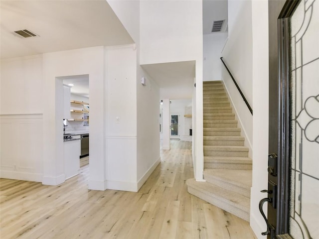 4109 Moss Hollow Dr, Round Rock, TX 78681 - foyer with light wood-type flooring and stairs
