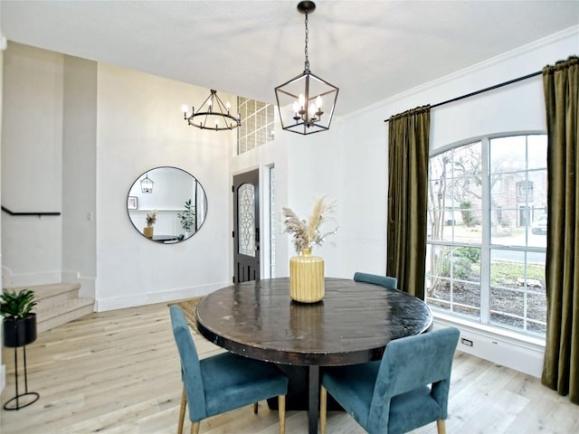 4109 Moss Hollow Dr, Round Rock, TX 78681 - dining space with a chandelier, light wood-type flooring, and baseboards