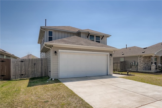 10317 Laurie Ln, Austin, TX 78747 - view of front facade featuring board and batten siding, concrete driveway, a shingled roof, and a garage