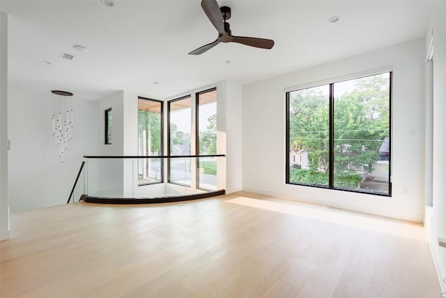 2807 Garwood St, Austin, TX 78702 - spare room with wood finished floors and a ceiling fan