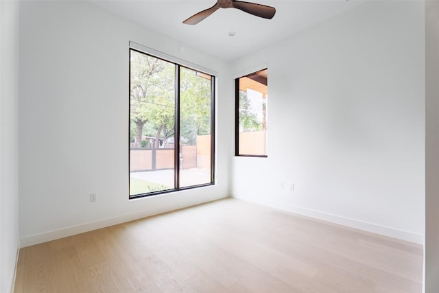 2807 Garwood St, Austin, TX 78702 - spare room featuring light wood-type flooring, baseboards, and ceiling fan