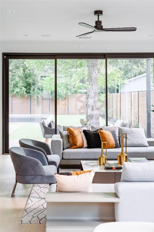 2807 Garwood St, Austin, TX 78702 - living area featuring ceiling fan and healthy amount of natural light