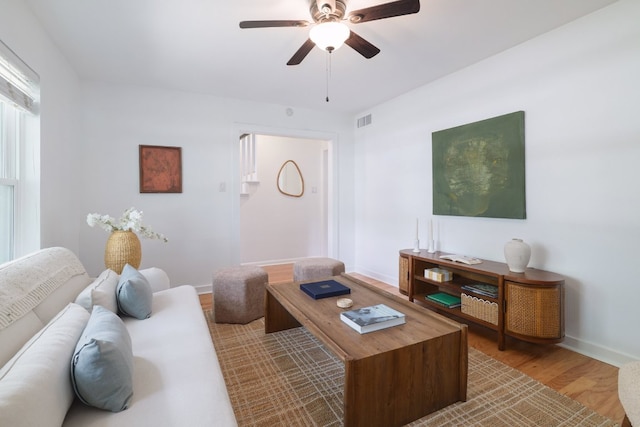 3303 S Oak Dr, Austin, TX 78704 - living area with wood finished floors, a ceiling fan, baseboards, and an office area