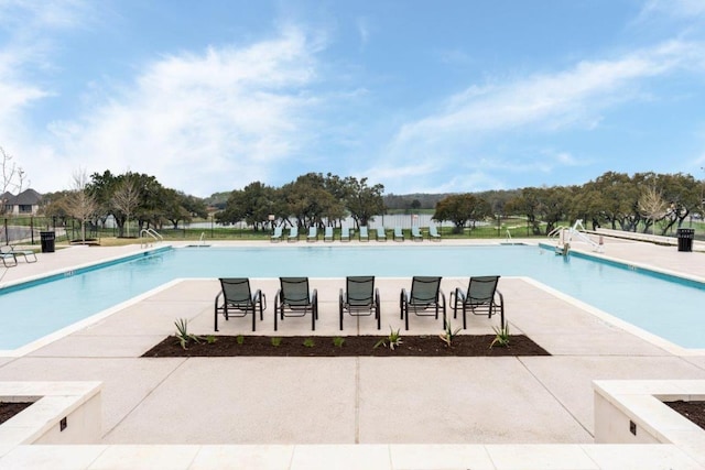 343 Jackson River Loop, Kyle, TX 78640 - community pool with a patio area