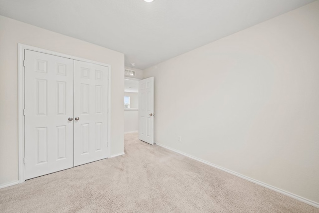 128 Rock Nettle, New Braunfels, TX 78130 - unfurnished bedroom featuring carpet, baseboards, and a closet
