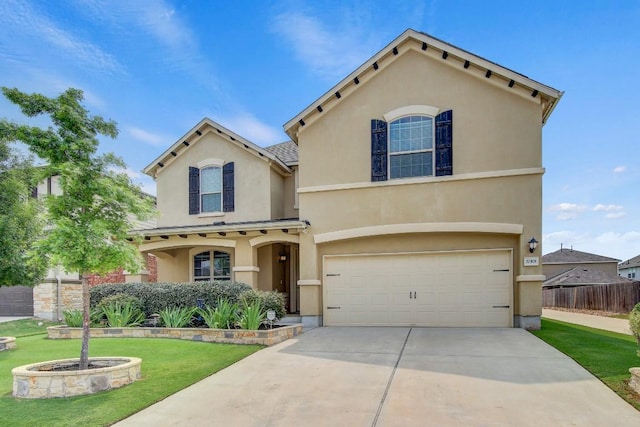 17101 Borromeo Ave, Pflugerville, TX 78660 - mediterranean / spanish-style house with stucco siding, a garage, and concrete driveway