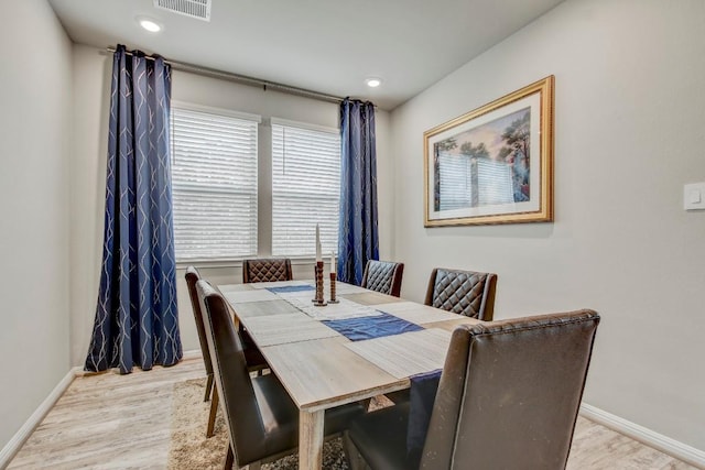 17101 Borromeo Ave, Pflugerville, TX 78660 - dining room featuring wood finished floors, baseboards, and recessed lighting