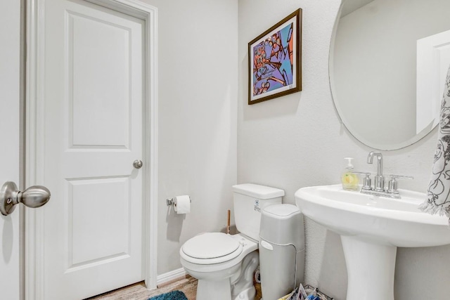 17101 Borromeo Ave, Pflugerville, TX 78660 - half bath featuring toilet and a sink