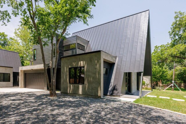 4506 Clawson Rd Unit 1, Austin, TX 78745 - modern home with a garage and driveway