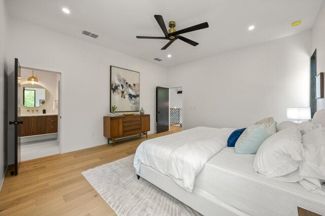 4506 Clawson Rd Unit 1, Austin, TX 78745 - bedroom with light wood-style flooring, recessed lighting, ceiling fan, and ensuite bathroom