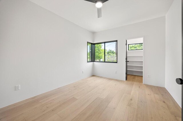 4506 Clawson Rd Unit 1, Austin, TX 78745 - unfurnished room featuring light wood-style flooring and ceiling fan