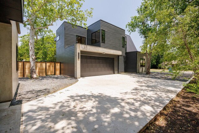 4506 Clawson Rd Unit 1, Austin, TX 78745 - view of front of property featuring a garage and concrete driveway