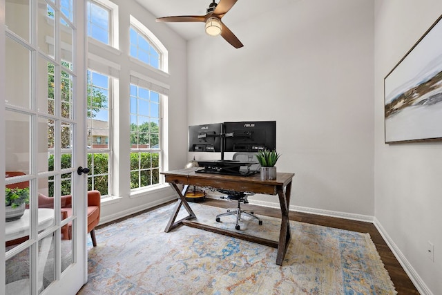2313 Legend Hill Dr, Leander, TX 78641 - home office with healthy amount of natural light, wood finished floors, french doors, and a high ceiling