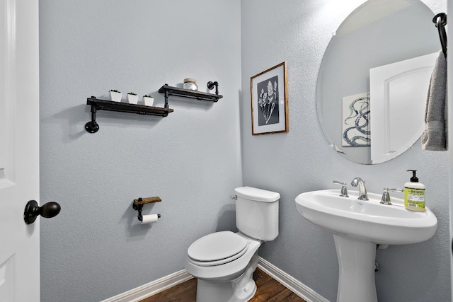 2313 Legend Hill Dr, Leander, TX 78641 - half bath with wood finished floors and toilet