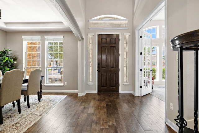 2313 Legend Hill Dr, Leander, TX 78641 - entrance foyer with dark wood finished floors and baseboards