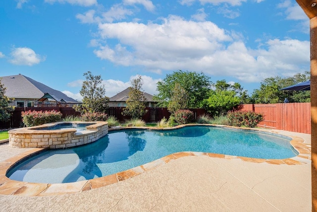 2313 Legend Hill Dr, Leander, TX 78641 - view of pool featuring a fenced backyard, a patio, and a pool with connected hot tub