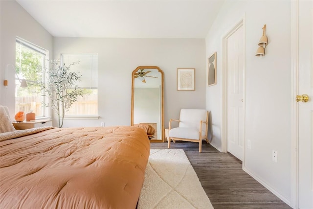 8908 Campo Verde Ct, Austin, TX 78749 - bedroom featuring dark wood-style flooring and baseboards