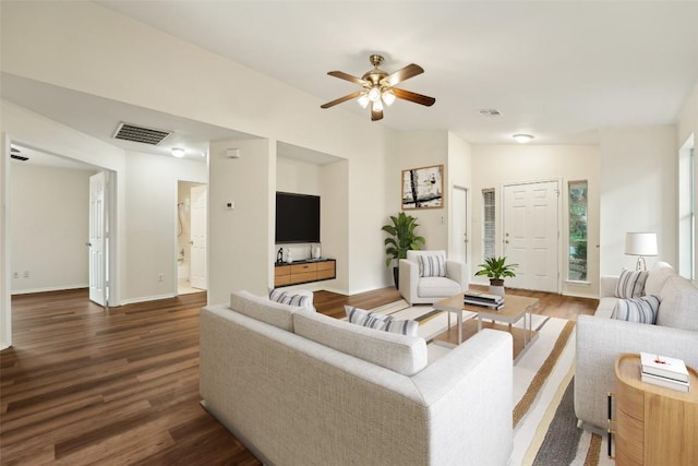 11201 Canterbury Tales Ln, Austin, TX 78748 - living area featuring wood finished floors, a ceiling fan, and baseboards