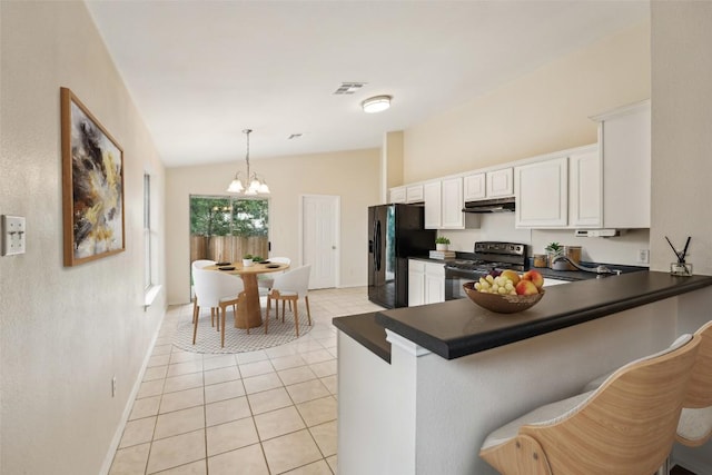 11201 Canterbury Tales Ln, Austin, TX 78748 - kitchen with black appliances, under cabinet range hood, dark countertops, baseboards, and lofted ceiling