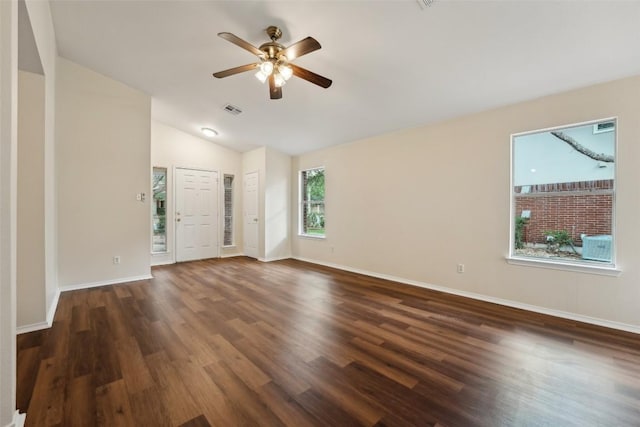11201 Canterbury Tales Ln, Austin, TX 78748 - unfurnished living room with ceiling fan, wood finished floors, vaulted ceiling, and baseboards