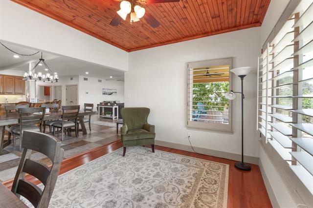 1002 Scenic Loop, Kingsland, TX 78639 - living room featuring wood ceiling, ceiling fan, ornamental molding, wood finished floors, and baseboards