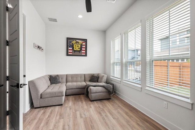 8904 Apogee Blvd, Austin, TX 78744 - living room with a ceiling fan, light wood-style floors, baseboards, and recessed lighting