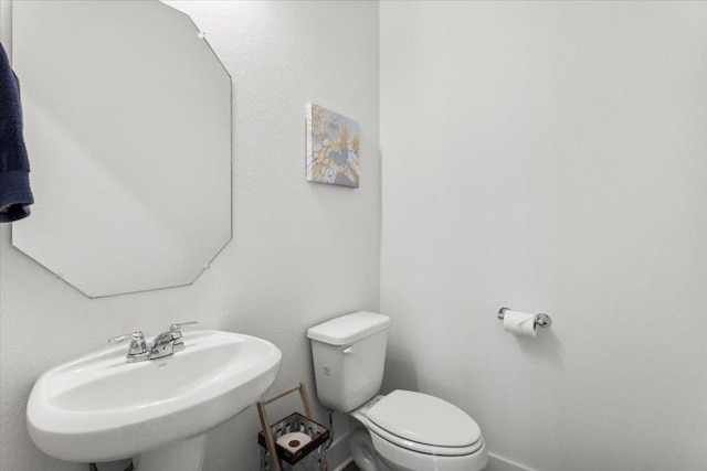 8904 Apogee Blvd, Austin, TX 78744 - bathroom with a sink and toilet