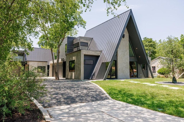 4506 Clawson Rd Unit 2, Austin, TX 78745 - a-frame style home featuring a front lawn, driveway, and stucco siding