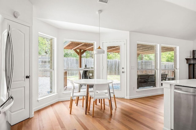 3712 Sawmill Dr, Austin, TX 78749 - dining area featuring light wood-style floors, healthy amount of natural light, and baseboards