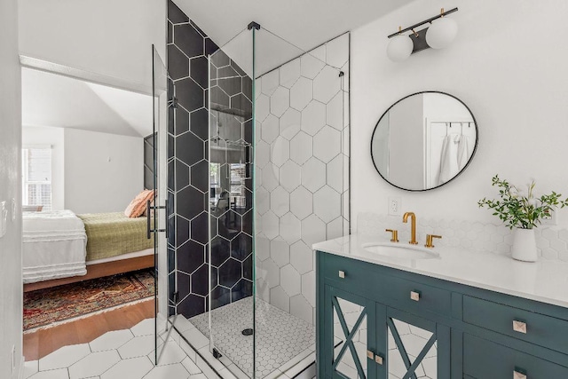 3712 Sawmill Dr, Austin, TX 78749 - ensuite bathroom with a shower stall, vanity, and wood finished floors
