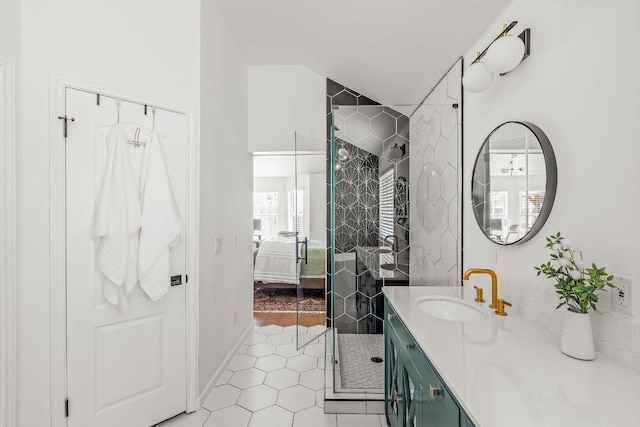 3712 Sawmill Dr, Austin, TX 78749 - bathroom with vanity, a shower stall, tile patterned flooring, ensuite bath, and baseboards