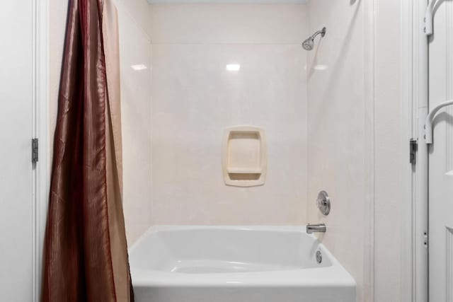 400 S Sledge St, Kyle, TX 78640 - bathroom featuring shower / bathtub combination with curtain