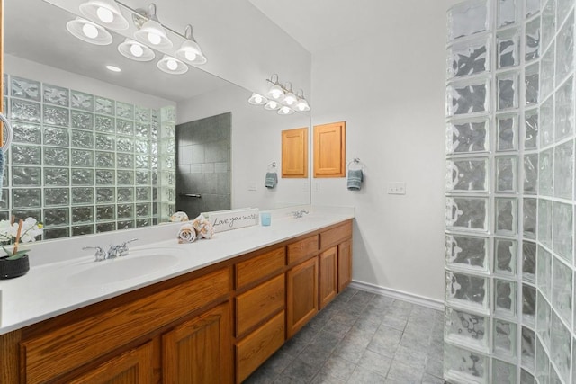 400 S Sledge St, Kyle, TX 78640 - full bathroom with double vanity and walk in shower