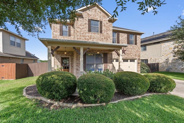 3517 Shellcastle Ln, Round Rock, TX 78681 - traditional-style house featuring brick siding and a garage