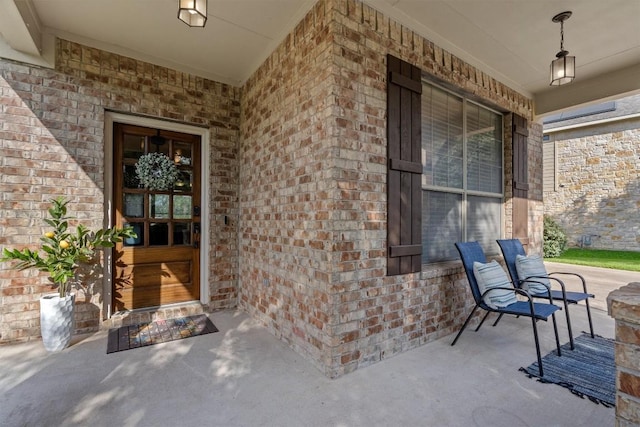 3517 Shellcastle Ln, Round Rock, TX 78681 - property entrance with a porch and brick siding