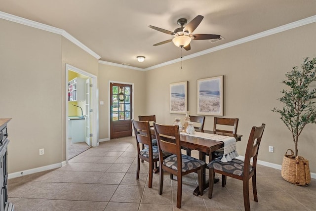 3517 Shellcastle Ln, Round Rock, TX 78681 - dining room with light tile patterned floors, ornamental molding, and a ceiling fan