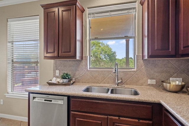 3517 Shellcastle Ln, Round Rock, TX 78681 - kitchen with dishwasher, decorative backsplash, healthy amount of natural light, and tile patterned flooring
